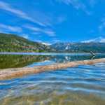 A lake overflowing its boundaries with flooding